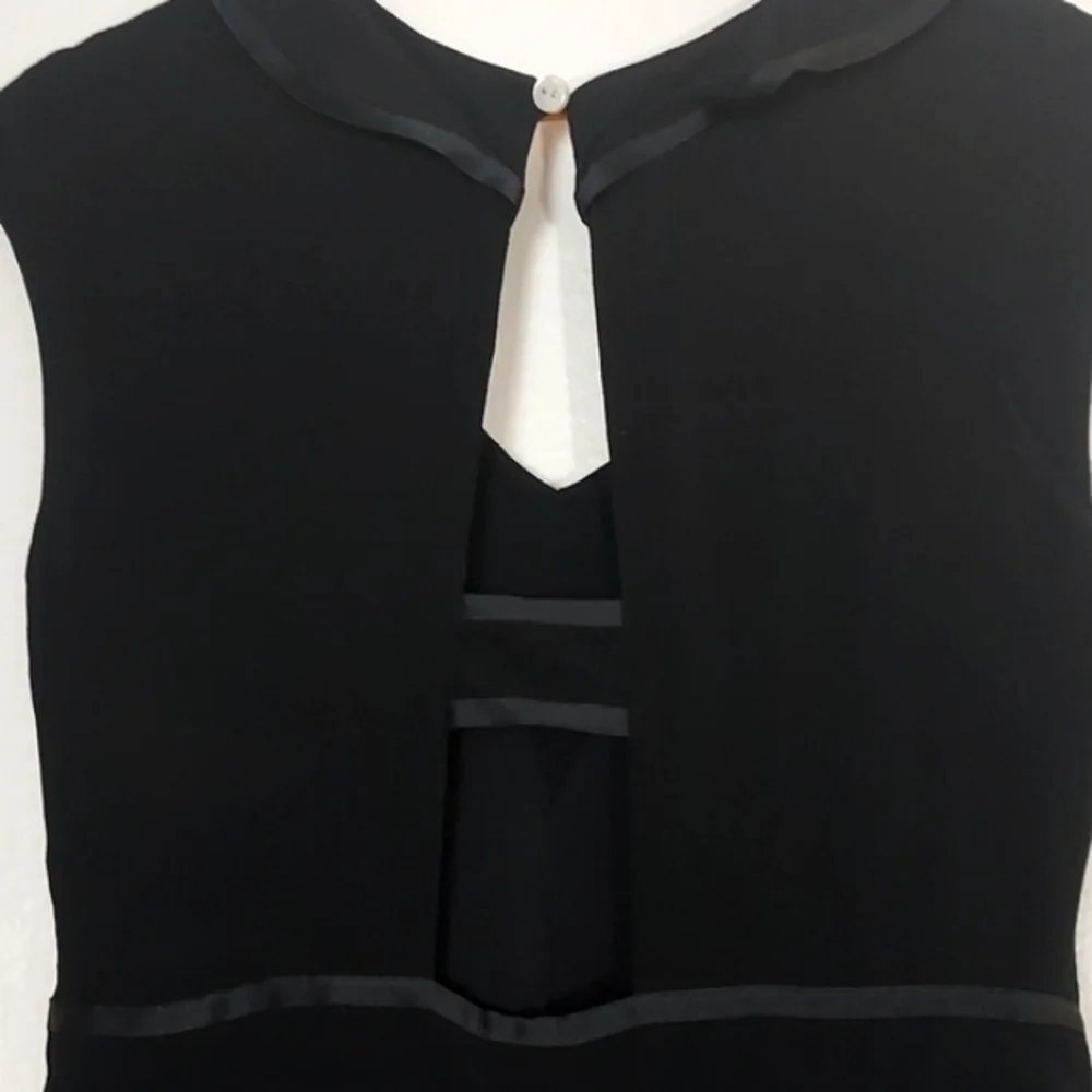 Anthropologie Romper Ruffled Black Size 6